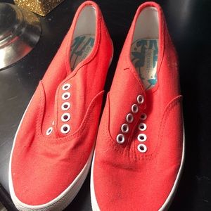 Bright orange tennis shoes